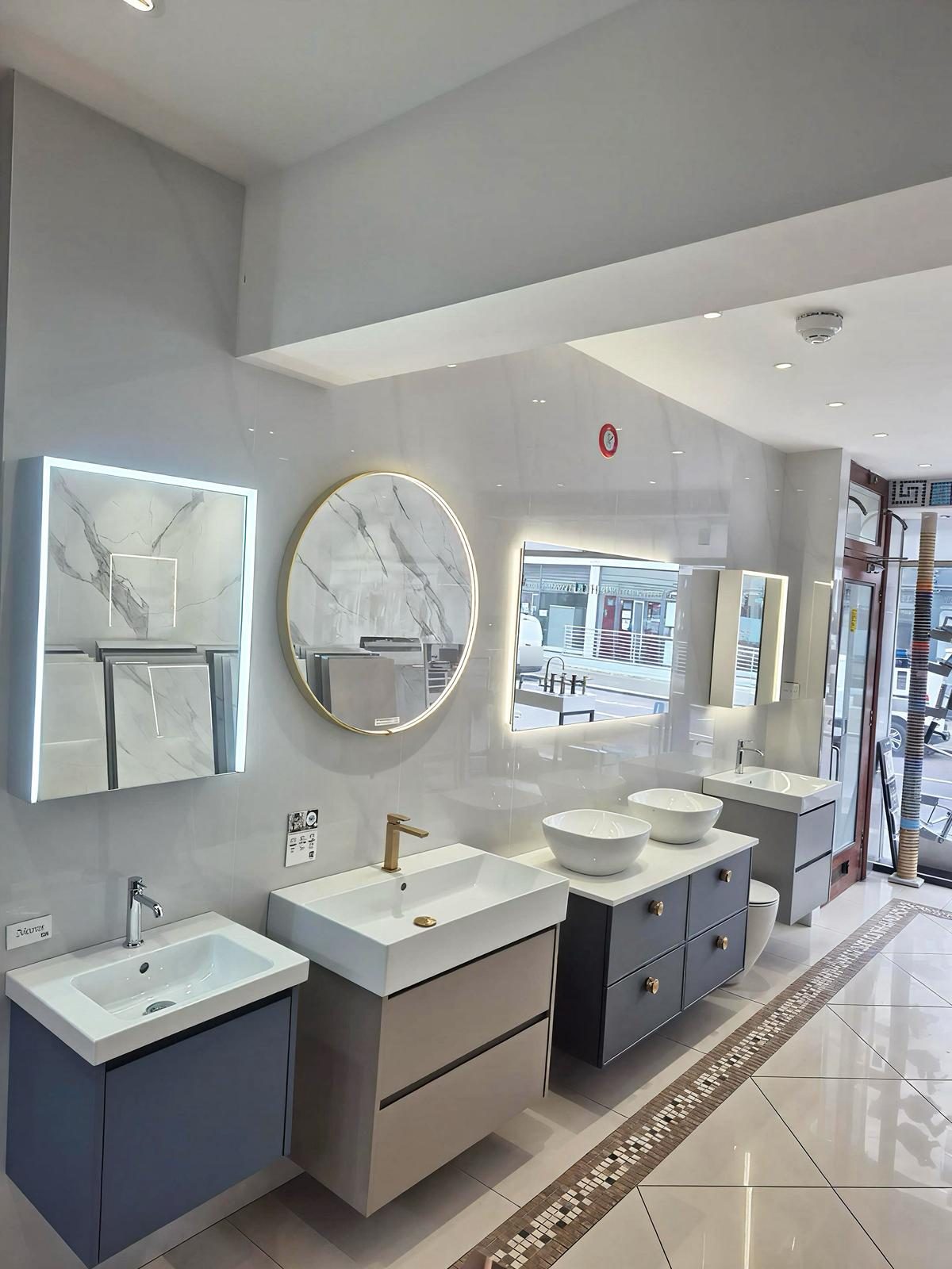 Vanity units with LED mirrors on display in the Marble Arch showroom
